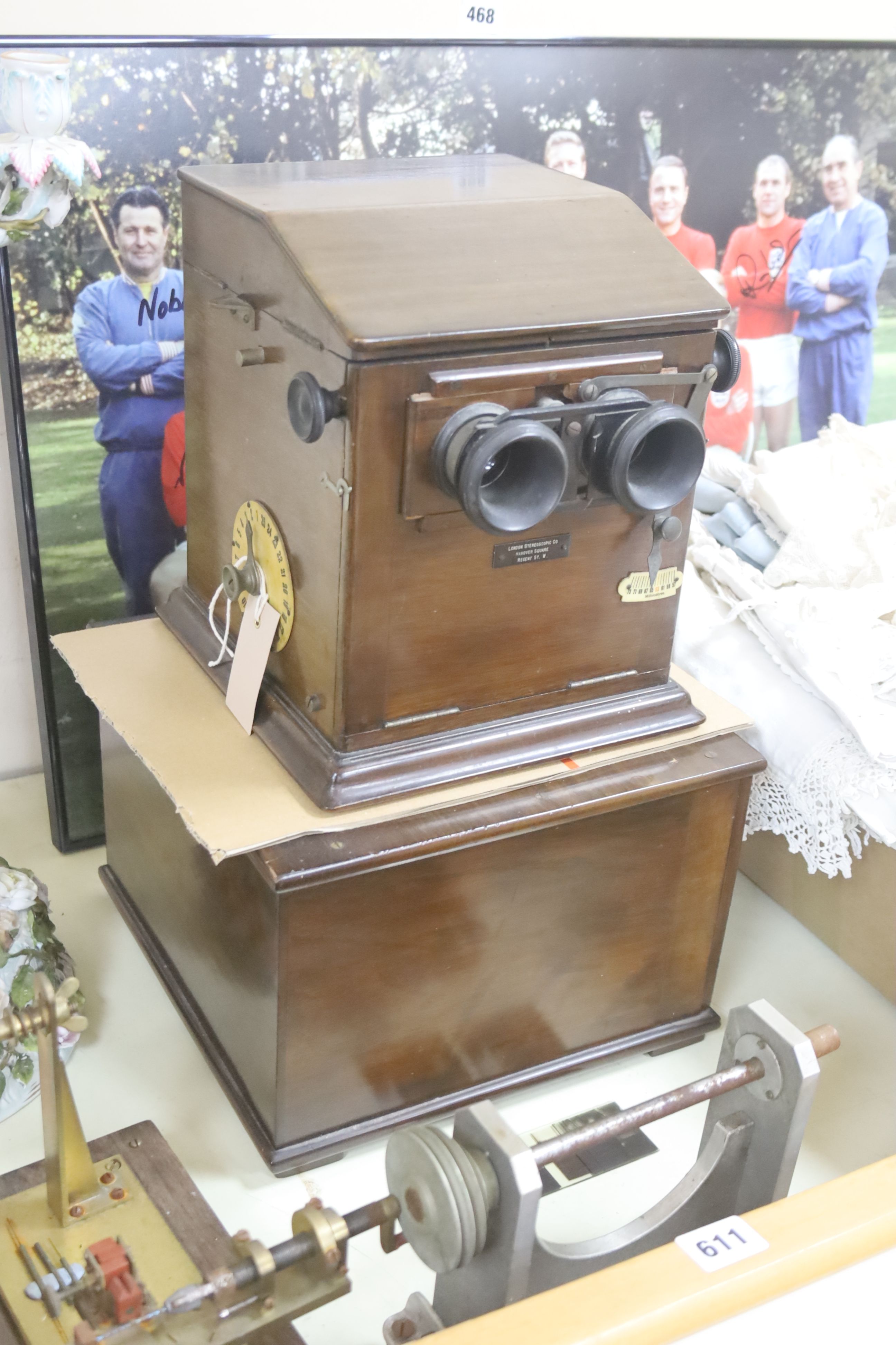 A late 19th century French mahogany cased stereoscopic Taxiphote viewer, together with a cabinet housing glass slides, height 46cm